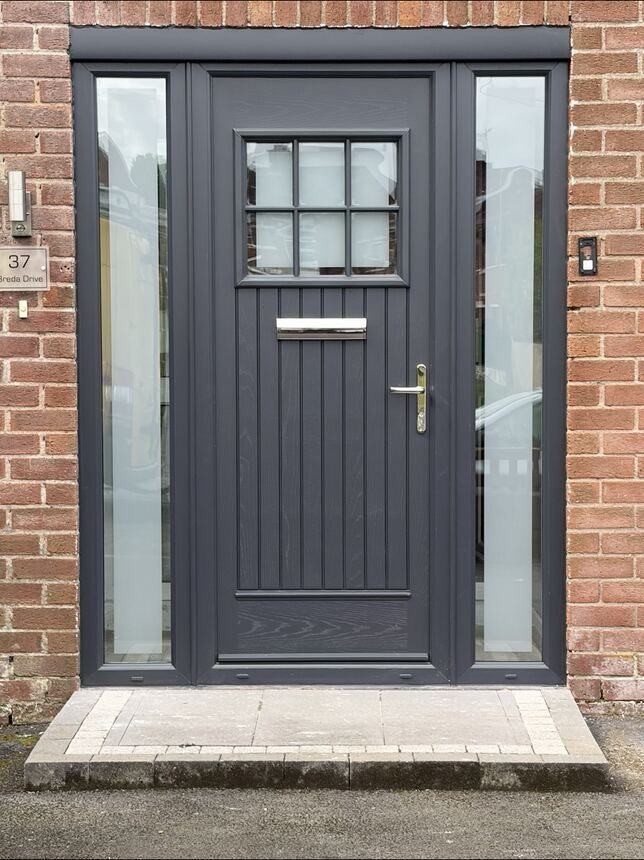 Anthracite grey composite door with Georgian bar glazing and full-height sidelights